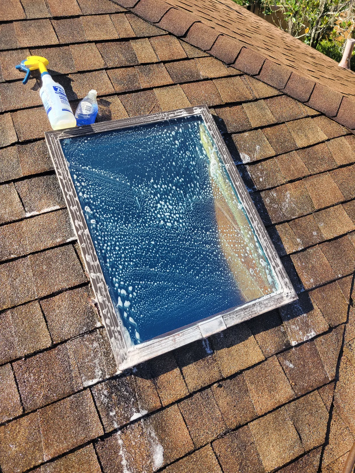 After: Skylight on a shingle roof. Grime and oxidation removed without high pressure.