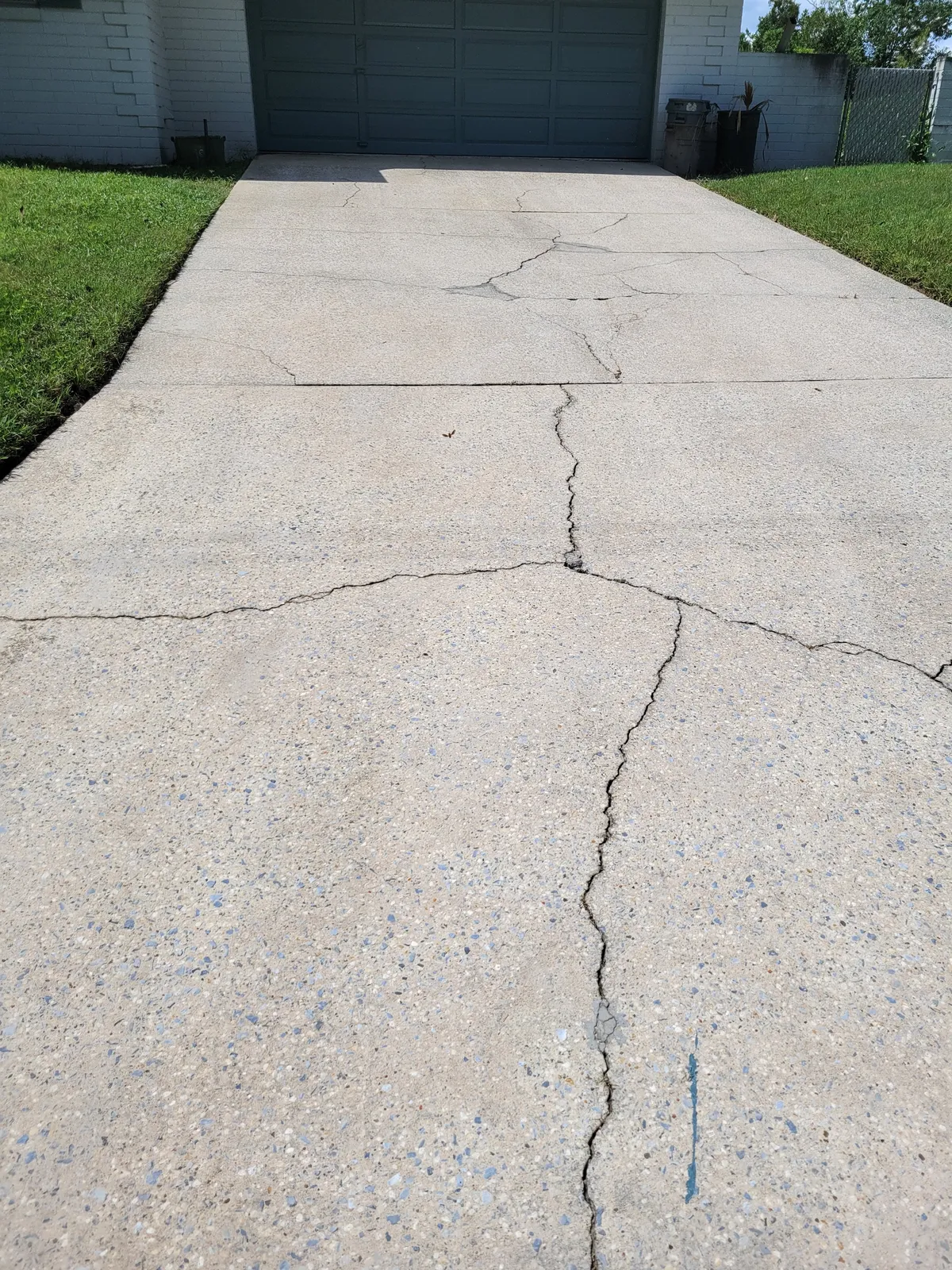 Clean driveway after pressure washing